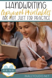 girl working on handwriting copywork with her mom