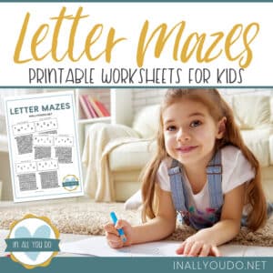 young girl writing while lying on a rug - overlay "Letter Mazes Printable Worksheets for Kids"